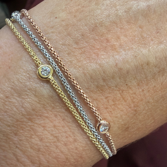 BRACCIALE TRE COLORI ZIRCONI